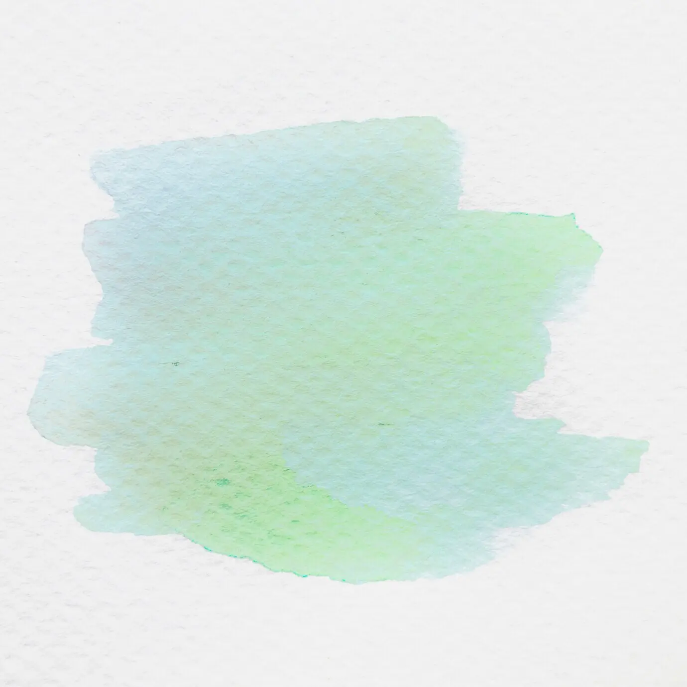 Nahaufnahme grüner Aquarellfarbe auf weißem Leinwandpapier